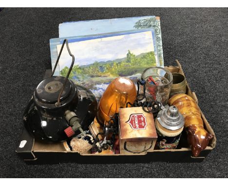 A box of framed and unframed oils on boards, beer steins, tankard, oil lamp etc 