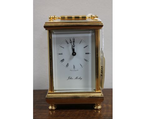 A modern John Mosley brass carriage clock, eleven jewel movement with platform escapement