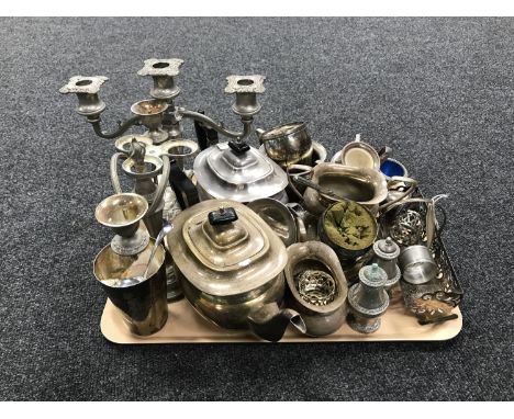 A tray containing a quantity of 20th century plated wares including Viners , plated tea service, napkin rings, candelabra etc