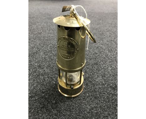An Eccles Type 6 brass miner's lamp