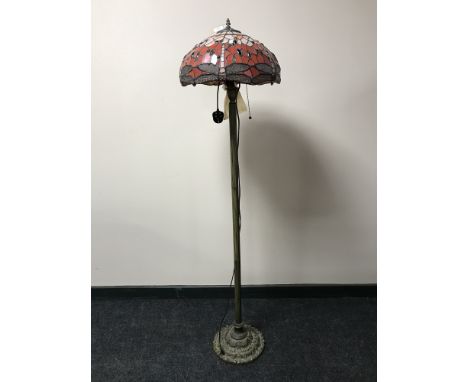A Tiffany style standard lamp with leaded dragonfly shade 