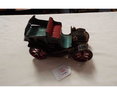 A Japanese vintage tin plate automobile, marked to back with patent numbers to base (A/F)