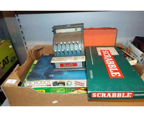 A selection of vintage games and a tin plate till