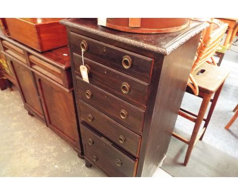 An early 20thC narrow chest of six graduated drawers, each with drop ring handles, raised on bracket feet