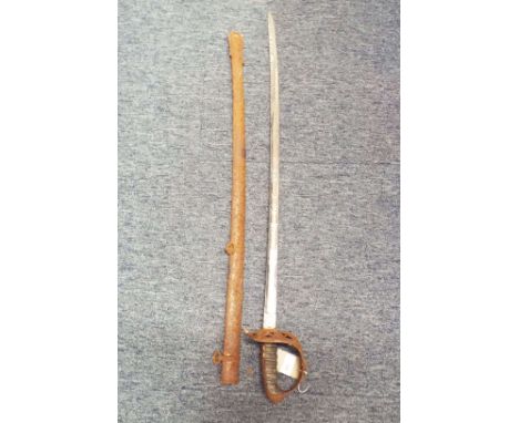 An early 20thC officer's sword by Henry Wilkinson, Pall Mall, London, with scrolling basket guard, shagreen handle and steppe