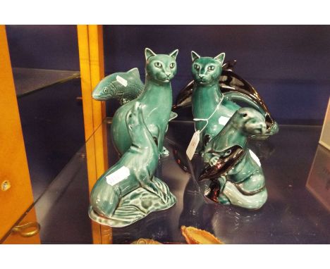A selection of Poole pottery figurines etc 