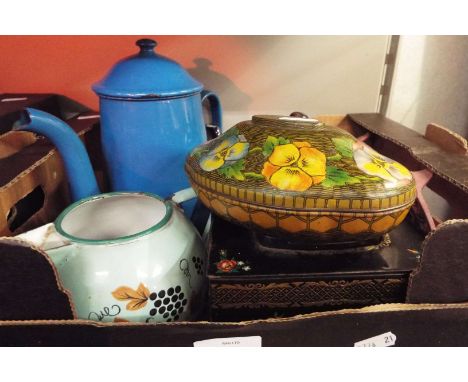 Three vintage French enamelled teapots, enamel tins etc