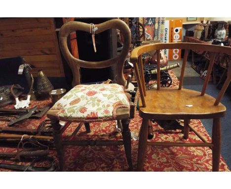 An early 20thC child's walnut bow back armchair together with a child's balloon back chair