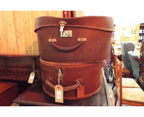 A vintage leather bound hat box and one other