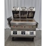 Taylor Commercial Foodservice stainless steel three zone clamshell grill