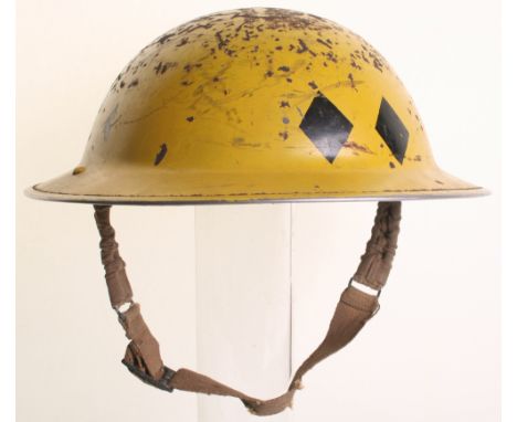 WW2 British Home Front Gas Officers Steel Helmet, with yellow paint finish to the exterior. Two black diamonds to the front a