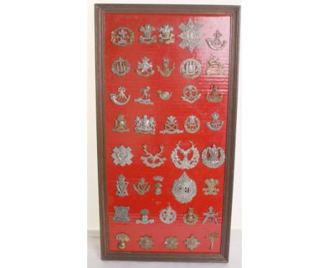 Frame of British Regimental Cap Badges, consisting of various regiments and periods including Grenadier Guards, Coldstream Gu