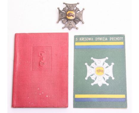 WW2 Polish 5th Kresowa Division Badge, white metal with enamel centre and central brass bull. 5 K P D to each arm of the Malt
