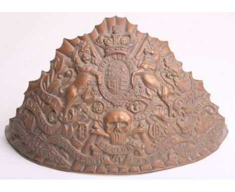 Victorian 17th (Duke of Cambridge’s Own) Lancers Helmet Plate, being an other ranks brass example with Royal arms, battle hon