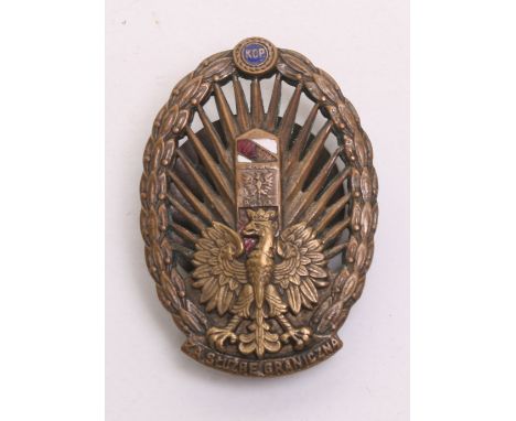 Polish Pre War Border Protection Body Breast Badge, two piece oval brass and enamel badge with Polish eagle to the lower sect