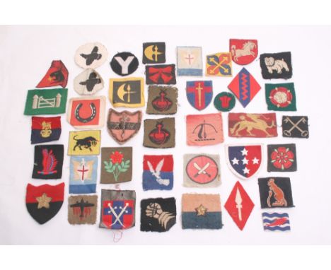Selection of British Cloth Formation Signs, including 2x embroidered 9th Anti-Aircraft division, woven 7th Armoured division,