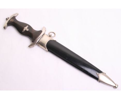 SS Enlisted Mans Dress Dagger, with black ebony handle having SS runes and eagle devices. The dagger is complete with its ori