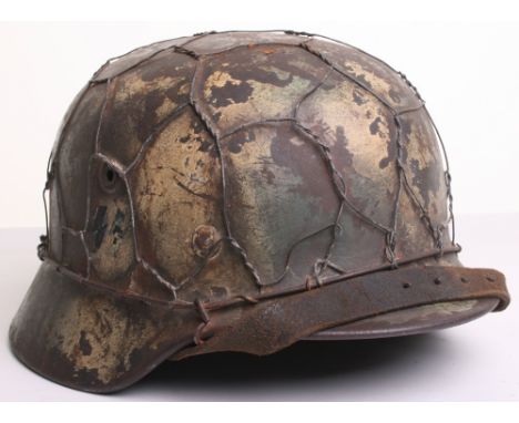 Waffen SS Camouflaged Steel Helmet, being a M40 pattern helmet shell with the exterior having a Normandy style camouflage pai