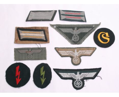 Selection of German Army (Heer) Cloth Insignia, consisting of 3x variations of German Army tunic breast eagles, un-issued Ger