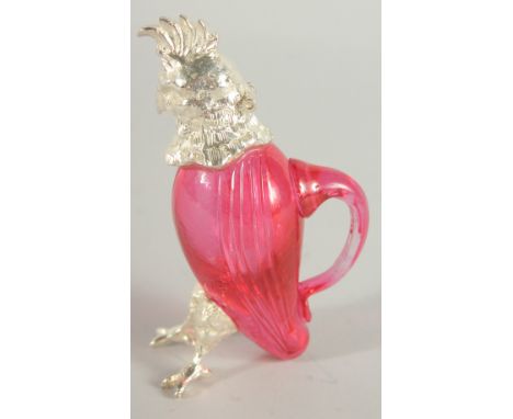 A SMALL RUBY GLASS AND SILVER PLATED COCKATOO DECANTER. 5ins high.