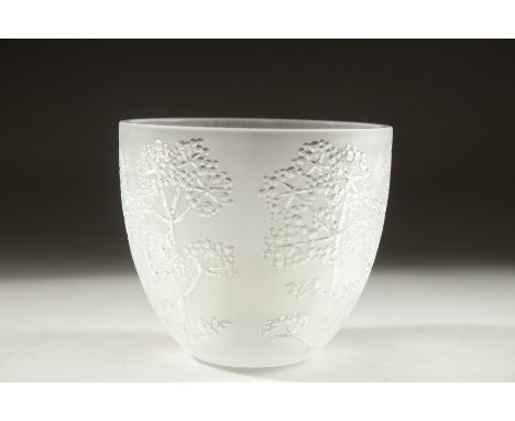 A GOOD LALIQUE CIRCULAR ENGRAVED NIGHT LIGHT. Signed, Lalique, France. 9cm diameter in a Lalique box with candle.