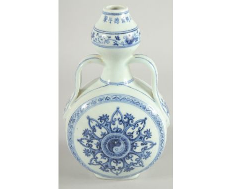 A CHINESE BLUE AND WHITE TWIN HANDLED MOON FLASK, with yin yang symbols. 27.5ins high.