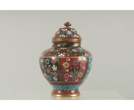 A CLOISONNE ENAMEL VASE AND COVER. 5.5ins high.