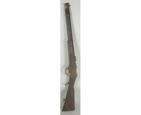 A NEPALESE GAHENDRA MARTINI HENRY CARBINE. 38" overall, 20" .450 barrel, ladder rear sight, falling breech with large under l