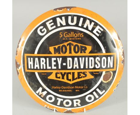 A CIRCULAR ENAMEL SIGN 'HARLEY DAVIDSON' 11.5ins diameter.