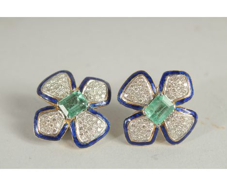 A SUPERB PAIR OF WHITE GOLD, DIAMOND, EMERALD AND BLUE ENAMEL FOUR LEAVES EAR CLIPS.