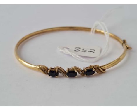 A sapphire &amp; diamond 9ct bangle 4.3g inc