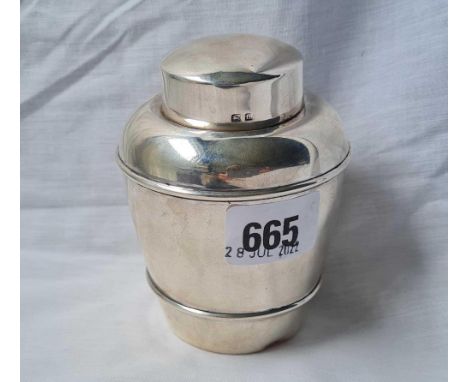A churn shaped tea caddy with pull off cover – 4” high – Birmingham 1919 by Goldsmiths Company – 130 g.