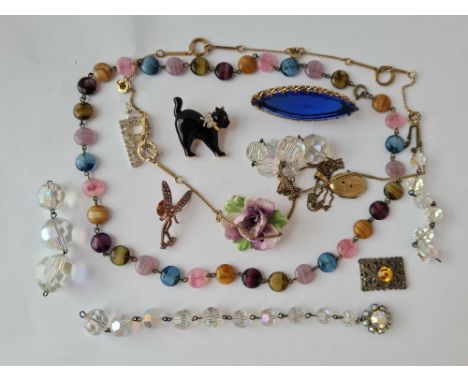 A bag of vintage costume jewellery