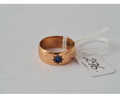 A plain wide sapphire set 9ct band ring size O 5.5g