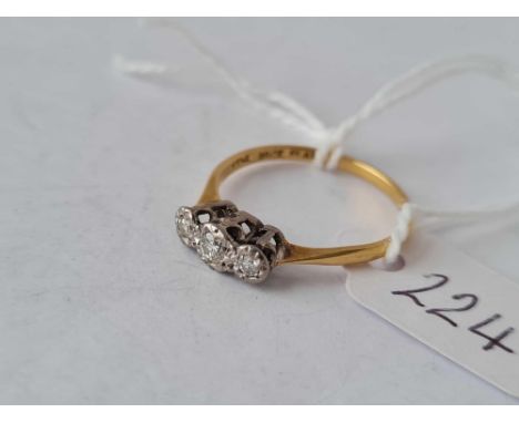 A three stone diamond ring 18ct gold size O ½ – 2 gms 