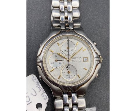 A gents SEIKO chronograph with seconds sweep and date aperture