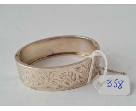 A silver bangle 