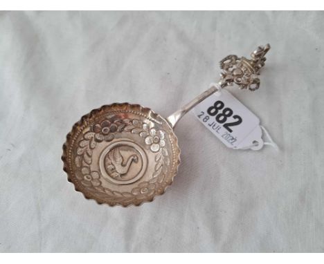 A Dutch caddy spoon the bowl embossed with a swan