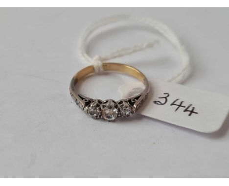 A three stone diamond ring 18ct gold size J – 1.4 gms 