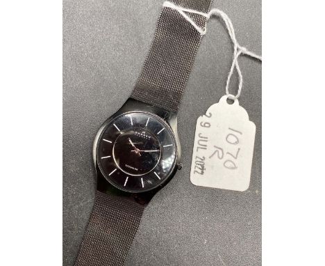 A gents SKAGEN Denmark titanium black faced wrist watch