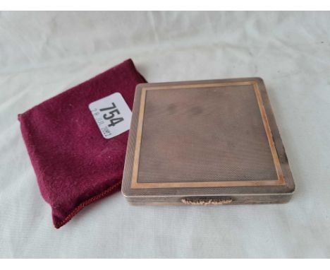 A good quality compact inset with gold band and finger push, 3" wide