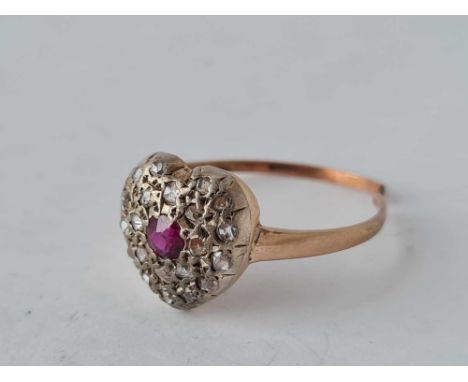 A Victorian heart shaped diamond and ruby set ring in gold size P ½ broken shank