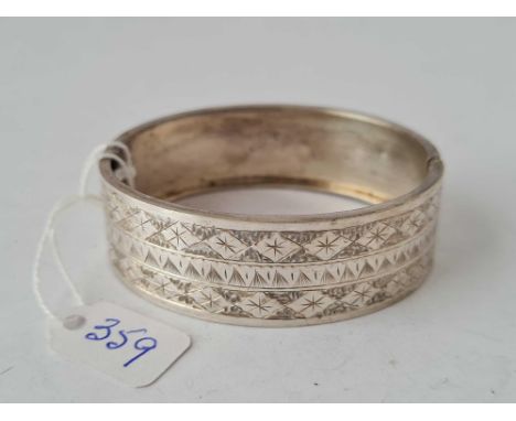 A silver bangle 