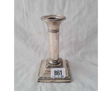 A square base candlestick with reeded and ribbon rims – 5” high – Chester 1912