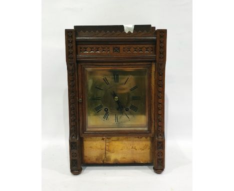 Late 19th century carved oak case mantel clock with square brass dial with roman numerals, striking movement, height 40cms