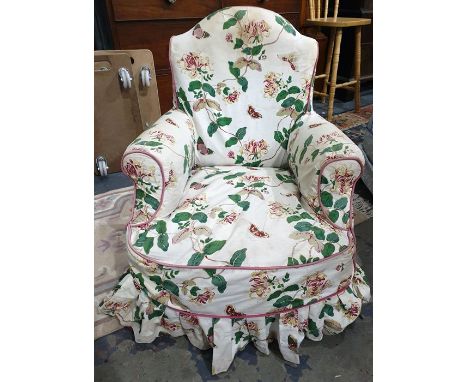 19th century salon type armchair raised upon finely turned and ring front legs, terminating to brown china castors, the swept