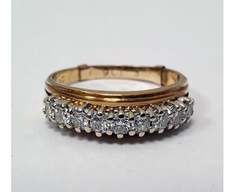 18ct gold band ring set with nine brilliant cut diamonds, finger size T