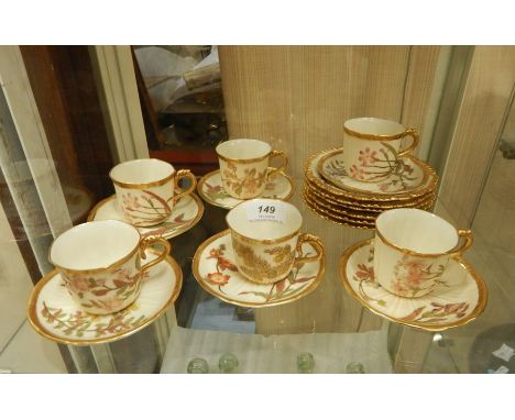 Set of six Royal Worcester cups, saucers and tea plates (one cup has a chip on the rim) 