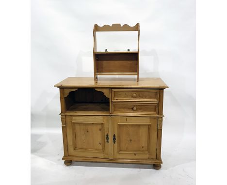 Contemporary pine cupboard with moulded edged top, open shelf, two short drawers with cupboards below, on bun feet, width 107