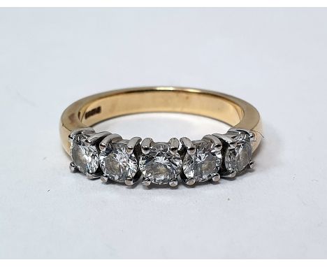 18ct gold five-stone diamond ring set with brilliant cut diamonds, finger size N1/2 